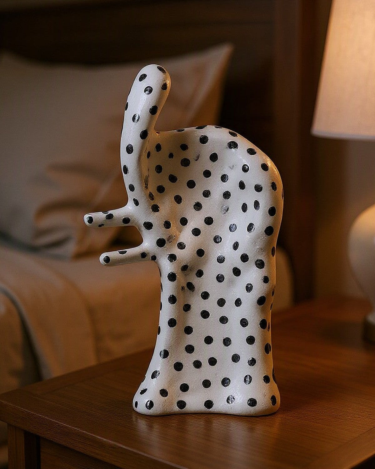 Dot Aggregation Ceramic Sculpture styled in a bedroom