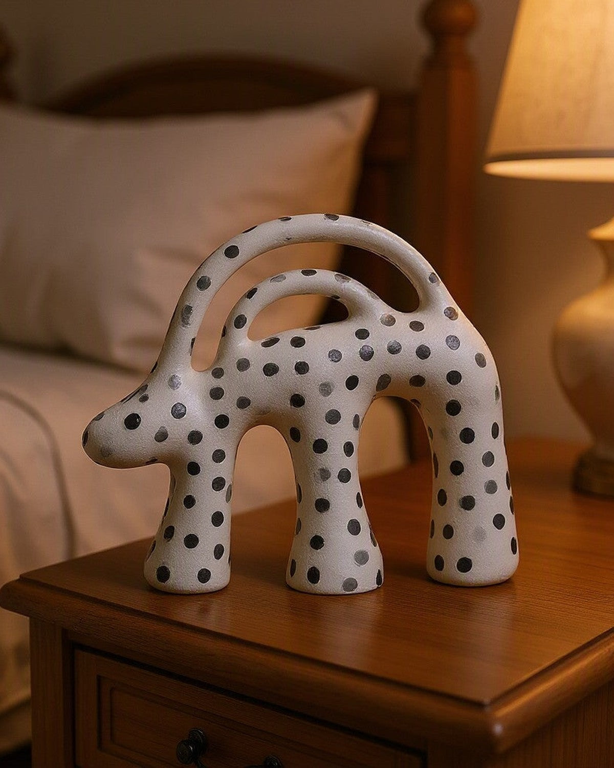 Dot Aggregation Ceramic Sculpture styled in a bedroom